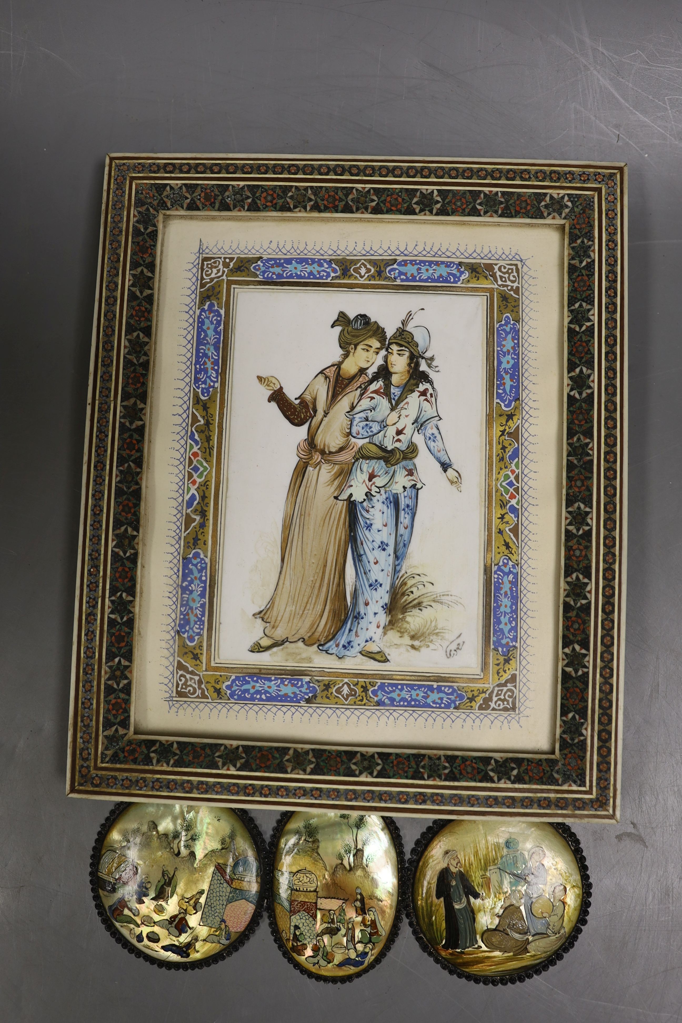 A Persian framed painting and three similar miniatures on pearl shell, 19 cms wide x23 cms high including frame.